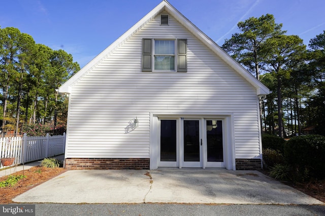 back of property featuring a patio area