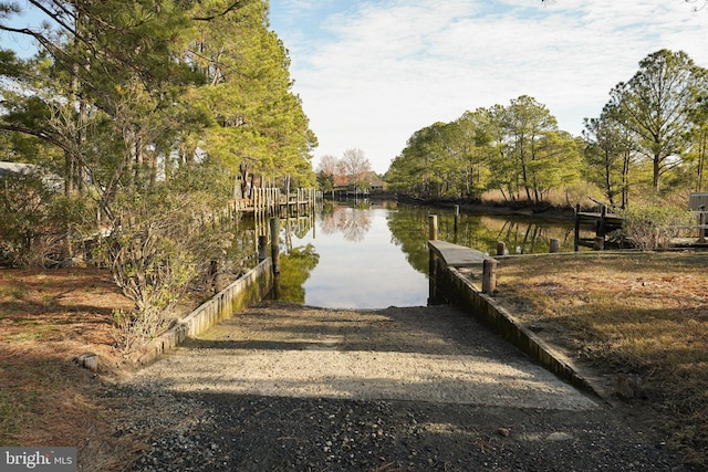 view of dock with a water view