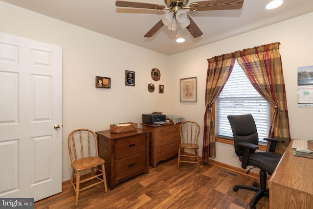 office area with ceiling fan and dark hardwood / wood-style floors