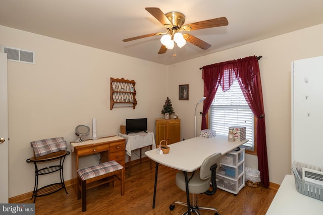 office featuring hardwood / wood-style flooring and ceiling fan