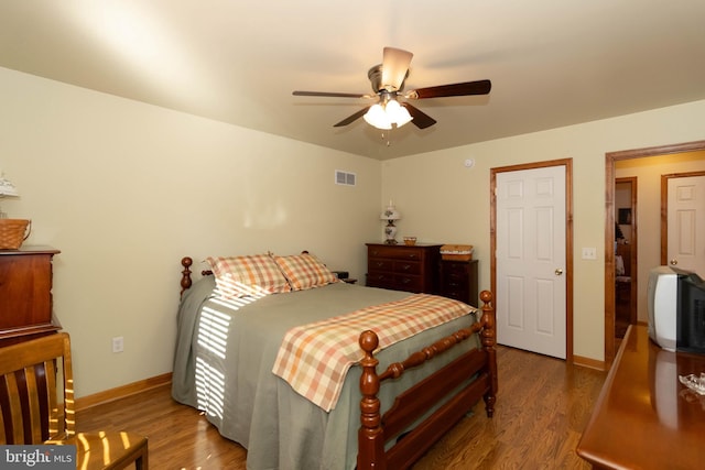 bedroom featuring wood-type flooring and ceiling fan