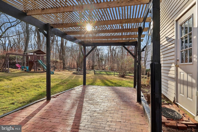 view of patio with a playground and a pergola