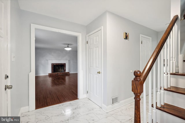 hallway with light wood-type flooring