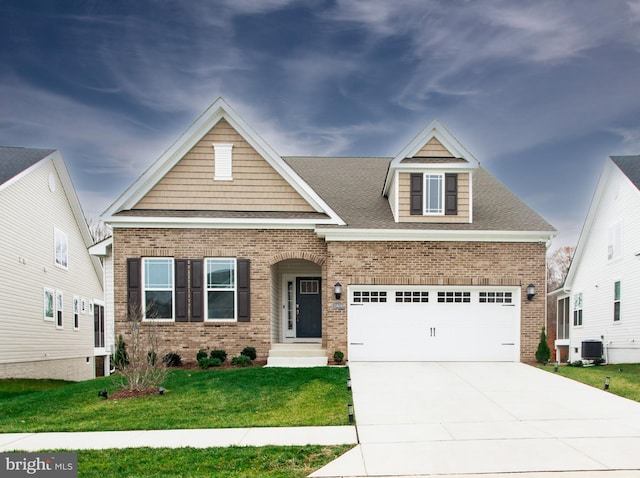 craftsman-style house featuring a front yard and central AC unit