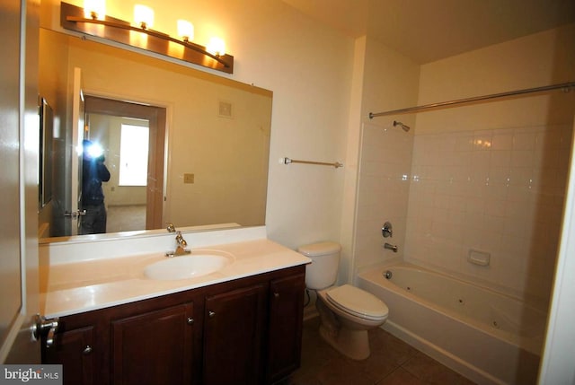 full bathroom with tile patterned floors, vanity, toilet, and shower / tub combination