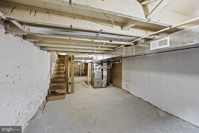 basement featuring heating unit