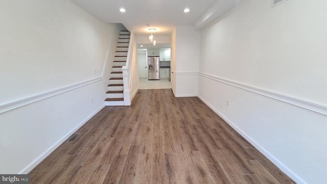 hall featuring dark hardwood / wood-style floors