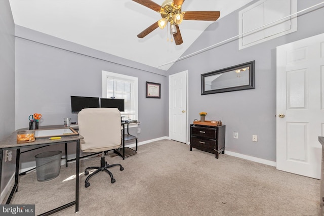 office area featuring light carpet, ceiling fan, and lofted ceiling