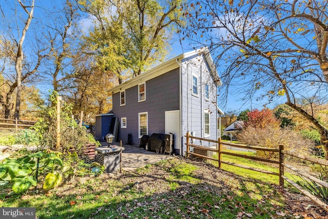 back of house featuring a patio area