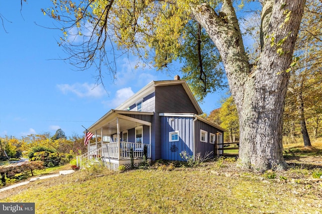 view of home's exterior with covered porch