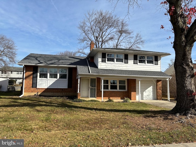 tri-level home featuring a front yard and a garage