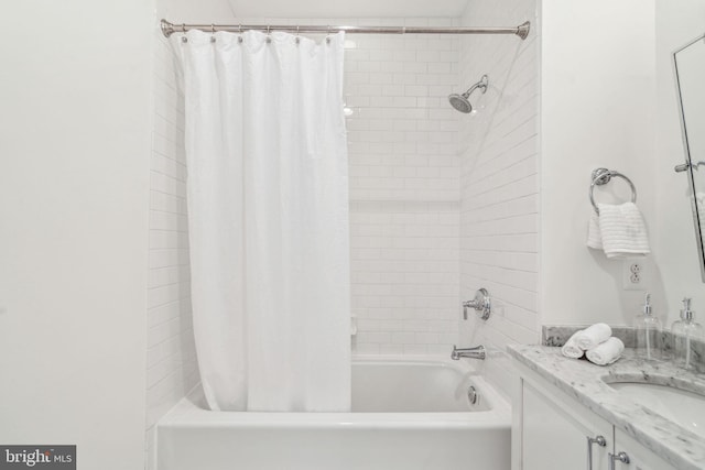 full bathroom with vanity and shower / tub combo with curtain