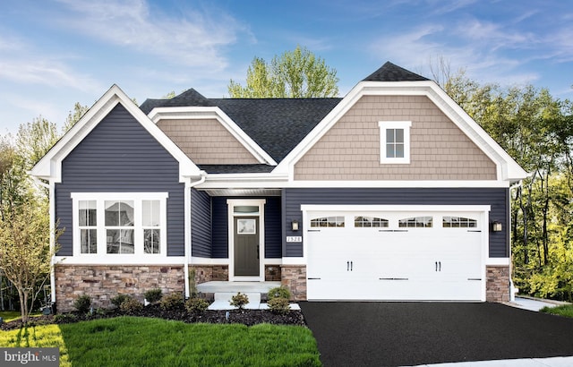 craftsman house with a garage