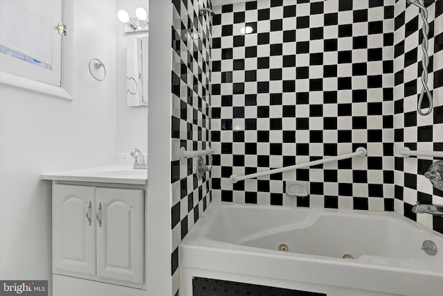 bathroom with vanity and a tub to relax in