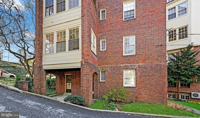 220 Stony Run Ln Unit Dg, Baltimore, MD 21210 - view of front facade featuring brick siding