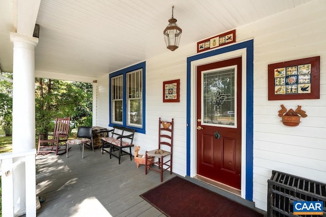 property entrance featuring covered porch