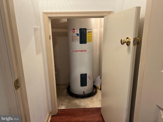 utility room with water heater