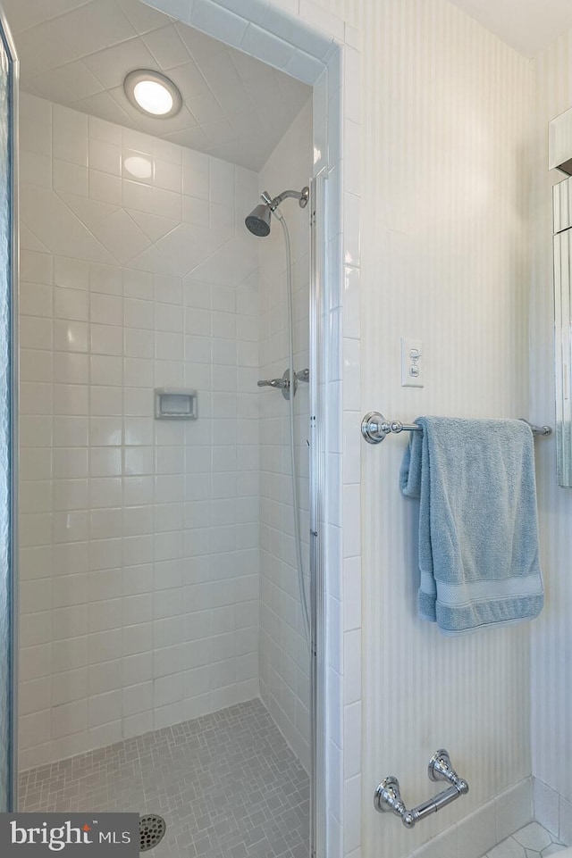 bathroom featuring an enclosed shower