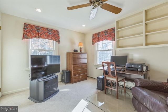 office featuring carpet and ceiling fan