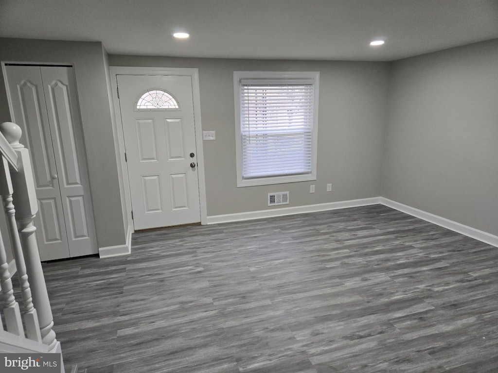 foyer featuring dark hardwood / wood-style floors