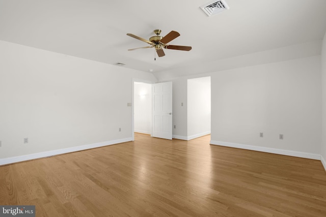 spare room featuring light wood-type flooring and ceiling fan