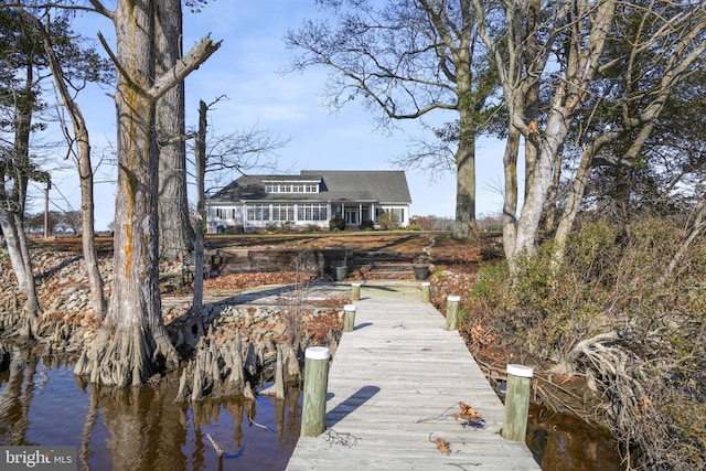 dock area featuring a water view