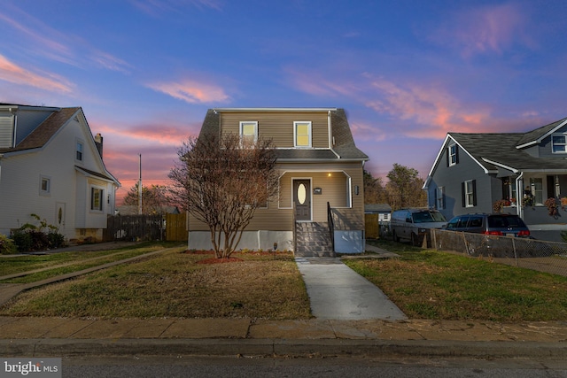 view of front facade with a yard