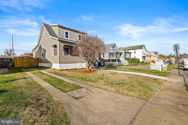 view of front facade with a front lawn