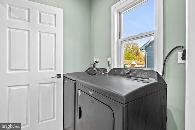 washroom featuring independent washer and dryer