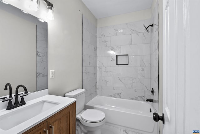 full bathroom featuring vanity, toilet, and tiled shower / bath combo