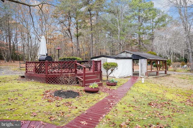 view of yard featuring a deck