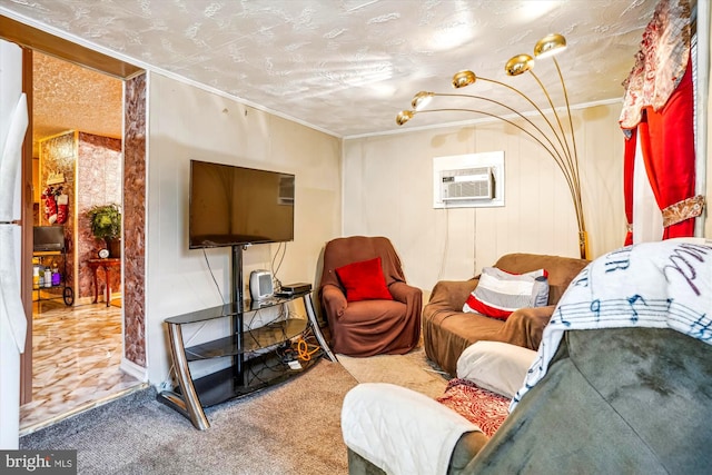 sitting room featuring ornamental molding, a textured ceiling, and a wall mounted AC