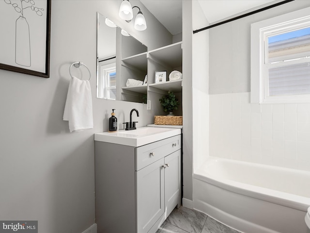 bathroom with vanity and bathing tub / shower combination