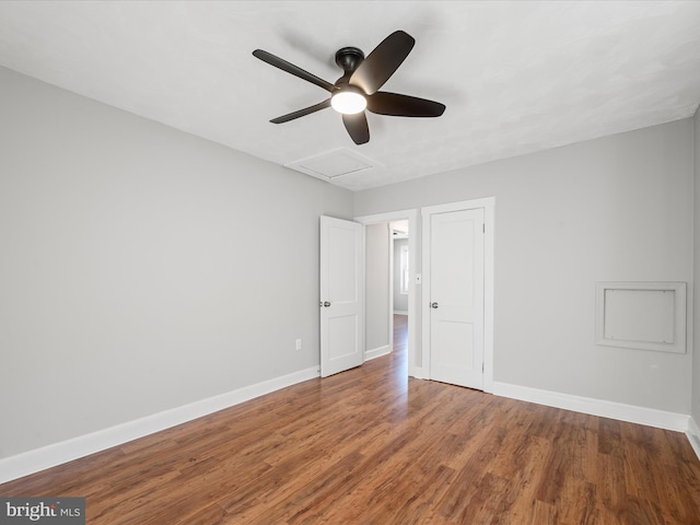 unfurnished room with hardwood / wood-style floors and ceiling fan