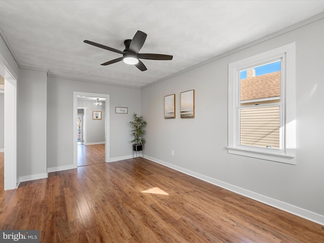 spare room featuring hardwood / wood-style flooring and ceiling fan