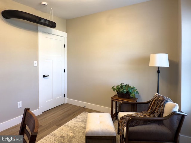 living area featuring hardwood / wood-style flooring