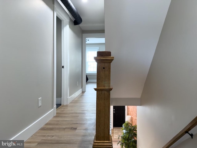 hallway featuring light hardwood / wood-style flooring