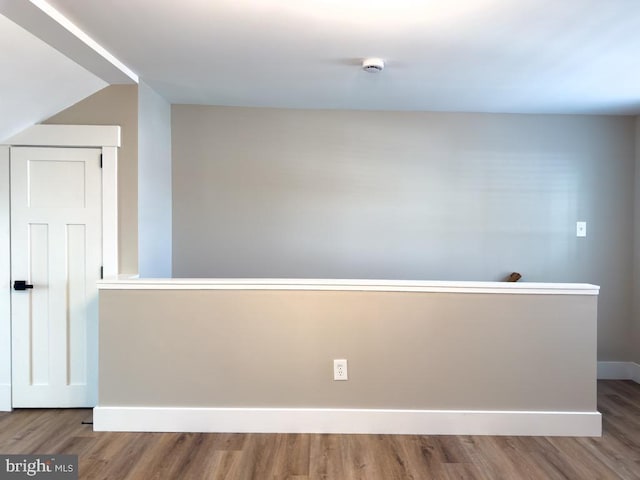 spare room featuring hardwood / wood-style floors