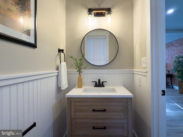 bathroom featuring hardwood / wood-style floors and vanity