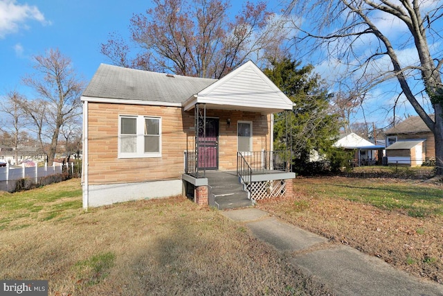 view of front of home with a front yard