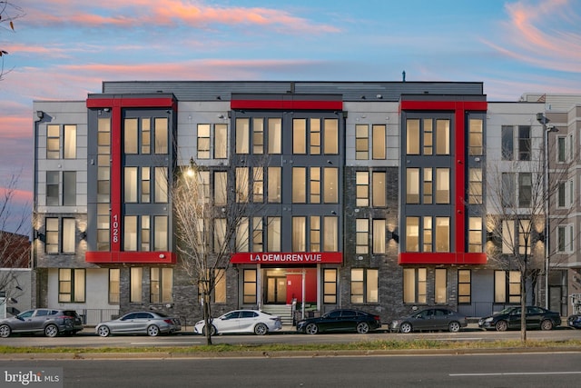 1028 Bladensburg Rd NE Unit 38, Washington, DC 20002 - property at dusk with view of commercial area