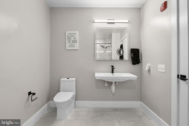 bathroom featuring toilet and sink