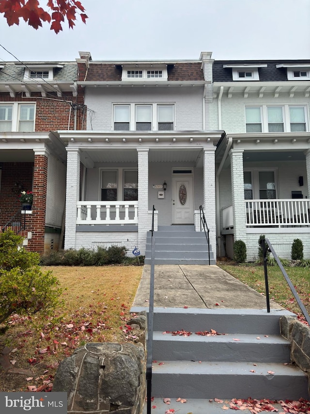 multi unit property featuring covered porch