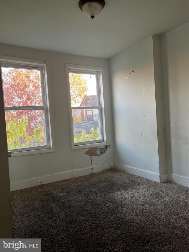 5131 Harlan St, Philadelphia, PA 19131 - empty room featuring baseboards and carpet