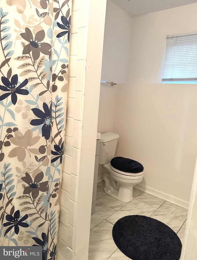 bathroom featuring toilet