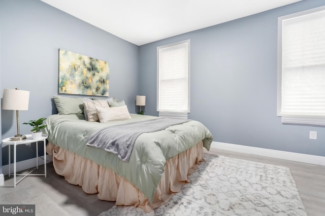 bedroom featuring hardwood / wood-style floors