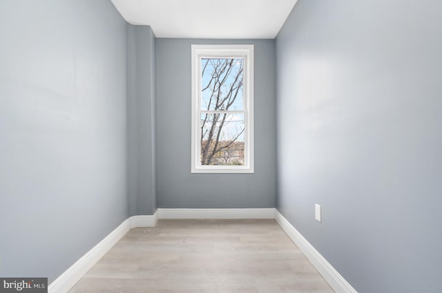 spare room featuring light hardwood / wood-style flooring