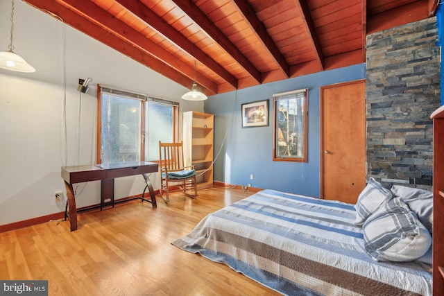 bedroom with wood ceiling, vaulted ceiling with beams, and wood-type flooring