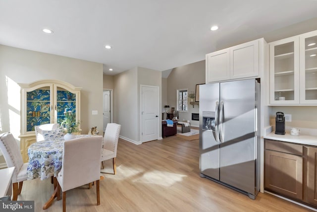 dining room featuring light wood-type flooring