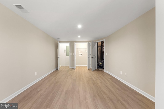 unfurnished bedroom featuring light wood-type flooring